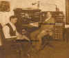 Office_with_Moore_desk_C._Downing_right_Arthur_Wood_sten_left_OM.jpg (301492 bytes)